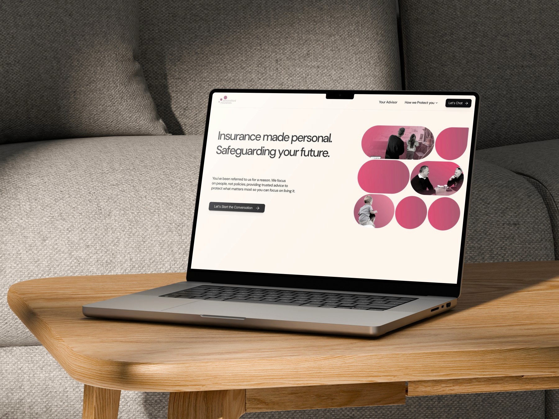 Personalised Insurance Website displayed on Laptop on Wooden Table