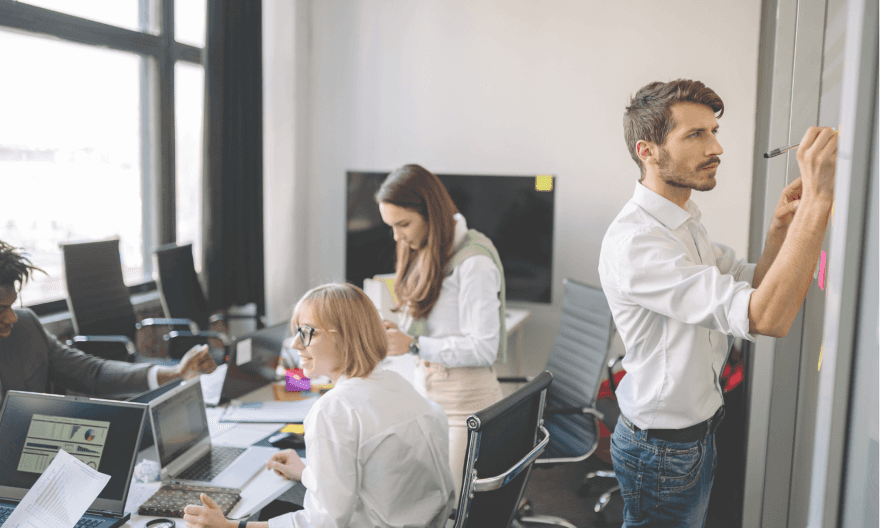 leaders collaborating in a small group for experiential learning.