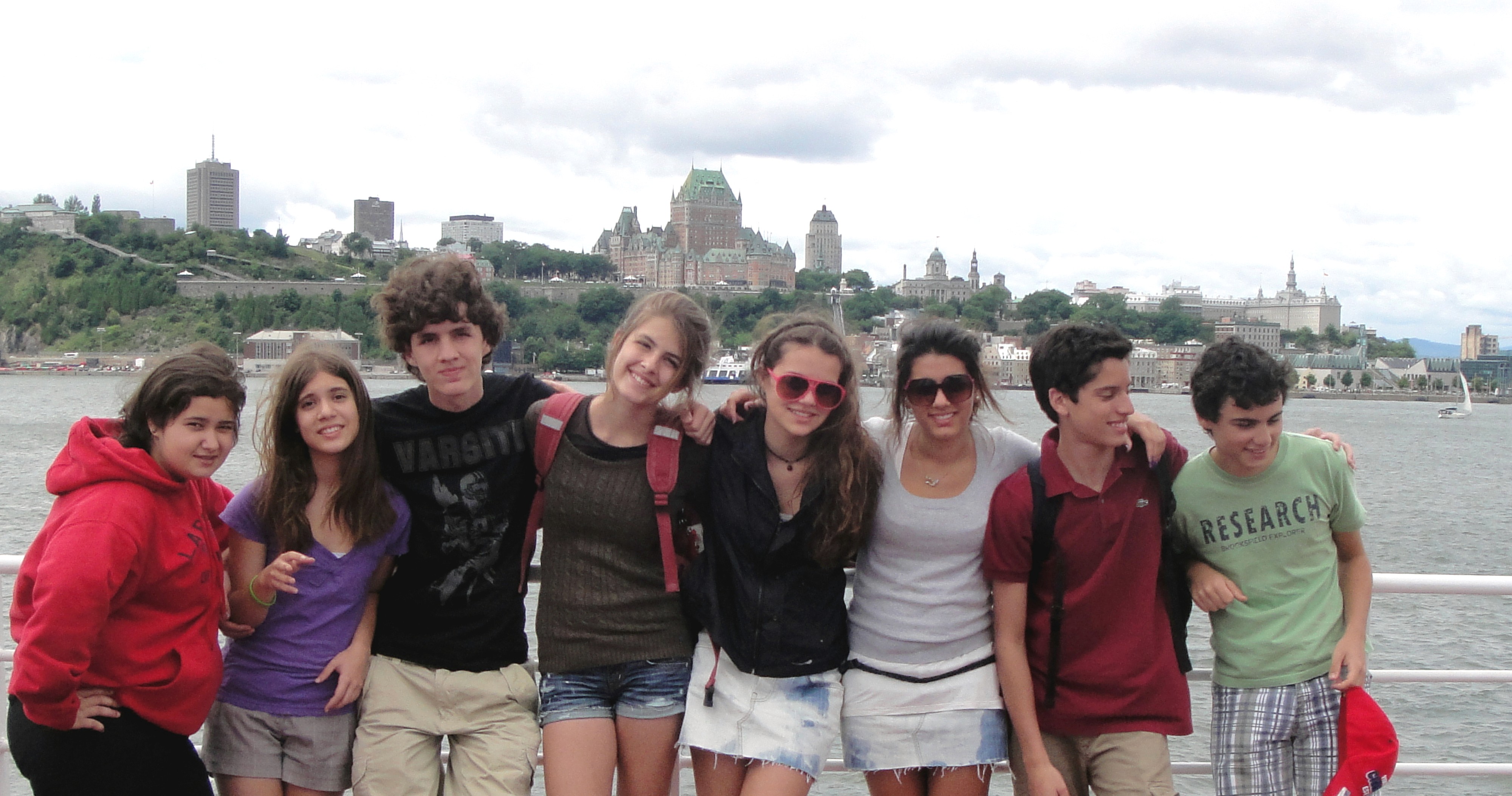 a lighthouse on a cliff by the ocean