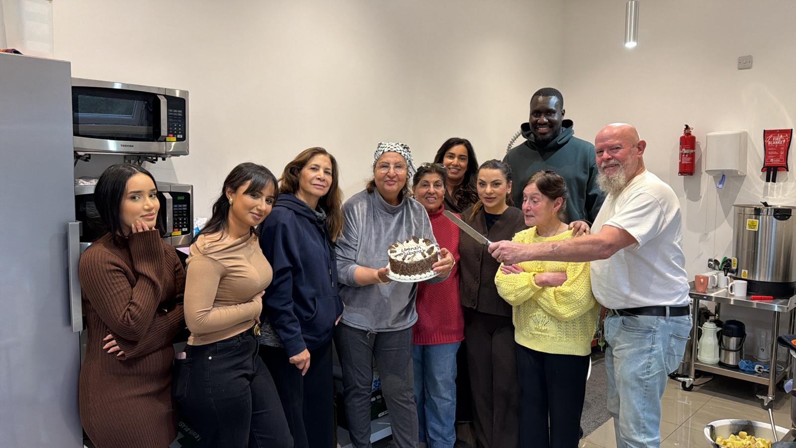 a black and white living room with a large tv