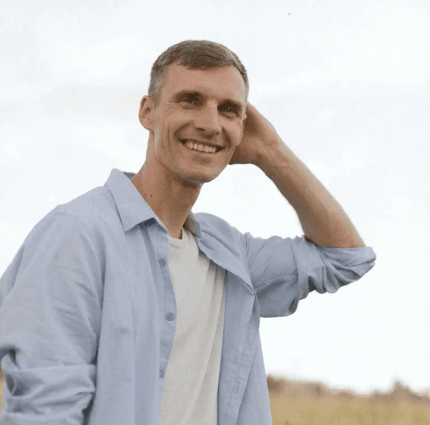 man smiling at the camera