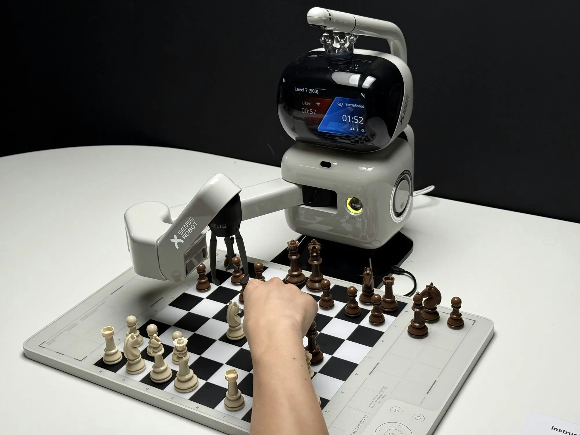 Robotic arm playing chess