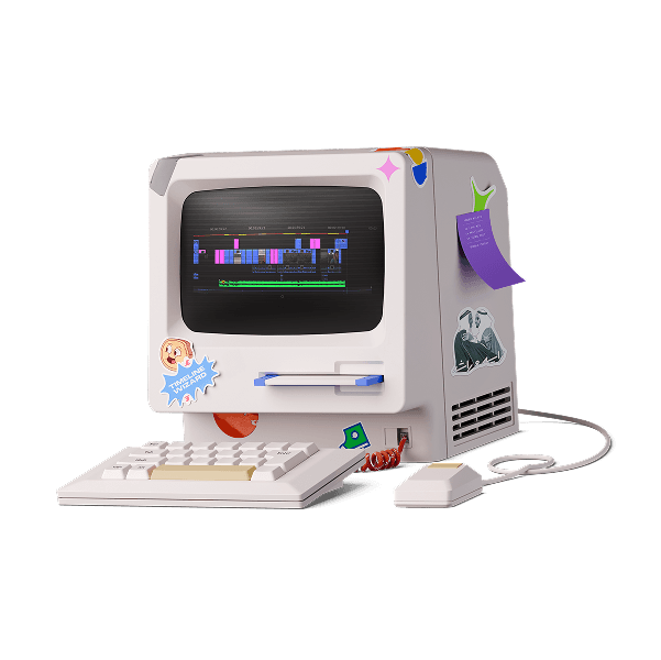 Retro-style personal computer with stickers on the monitor and side. The computer is off-white with a matching keyboard and mouse.