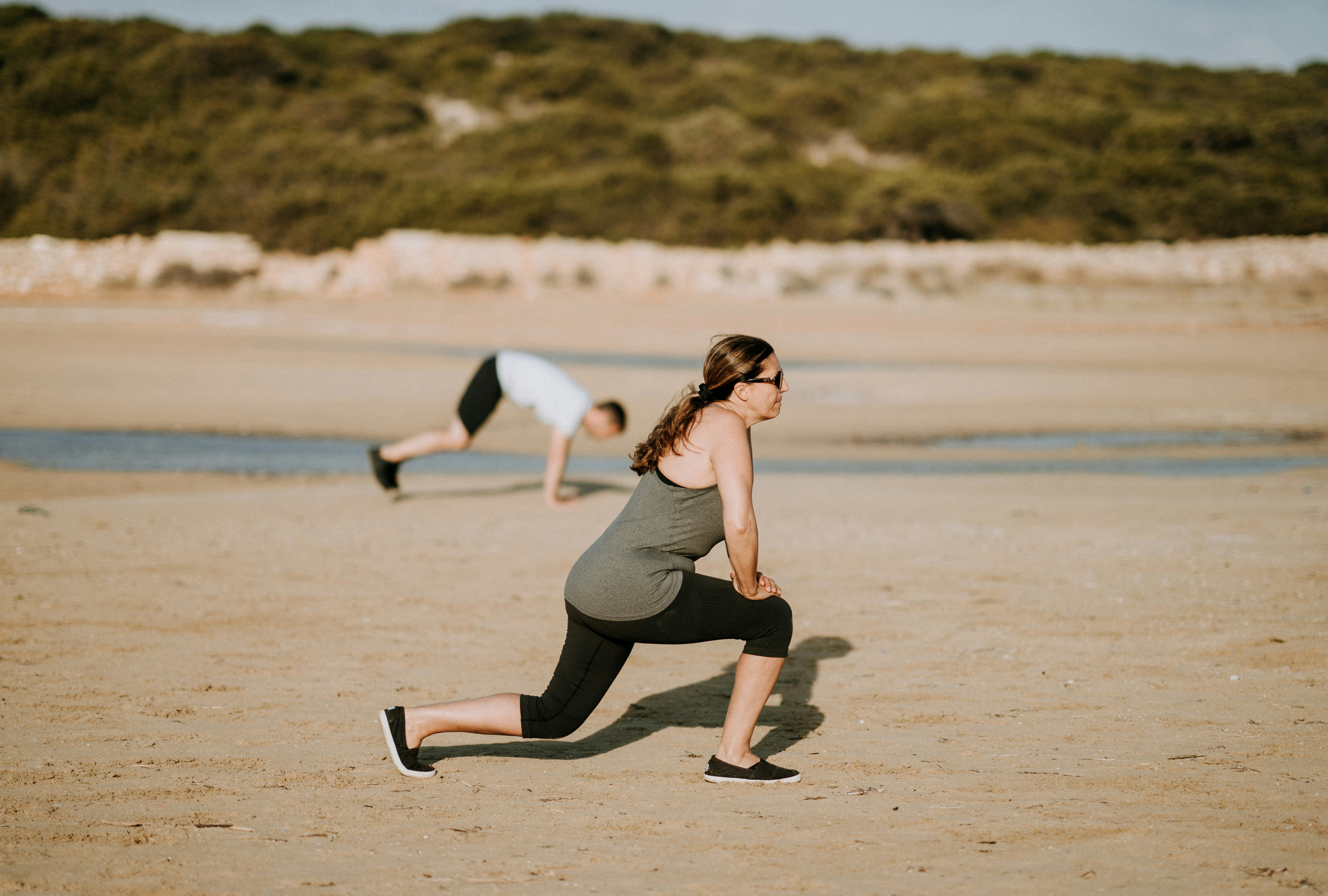 women stretching before their run