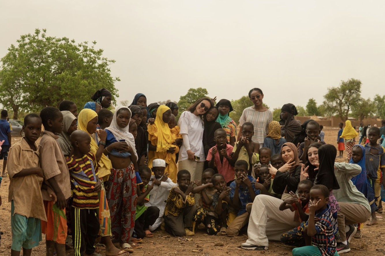 man sitting beside woman looking at a contract on DocuSign