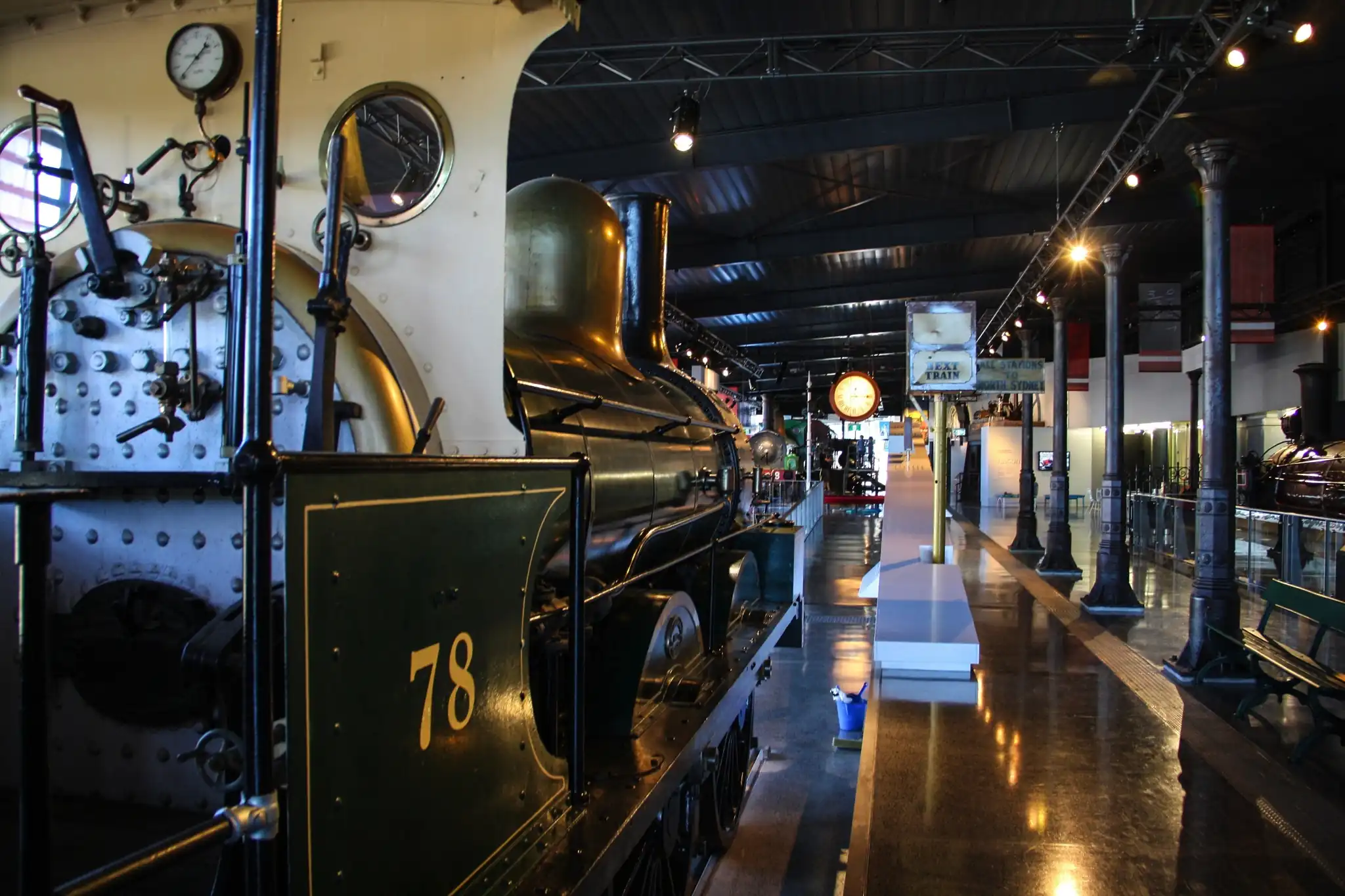A man inspects the lever frames on display at the NSW Rail Museum.