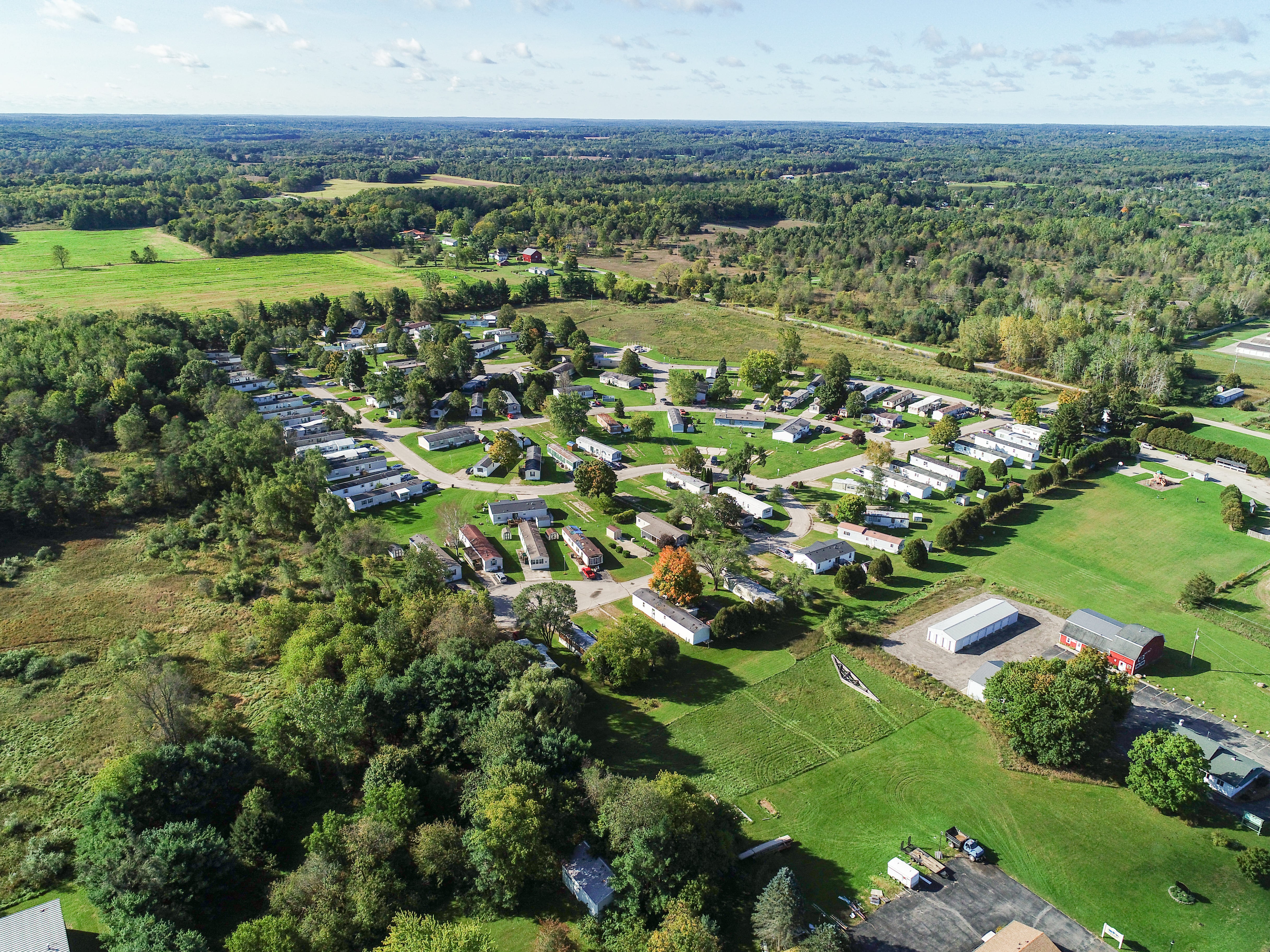 mobile home community with lush greenery