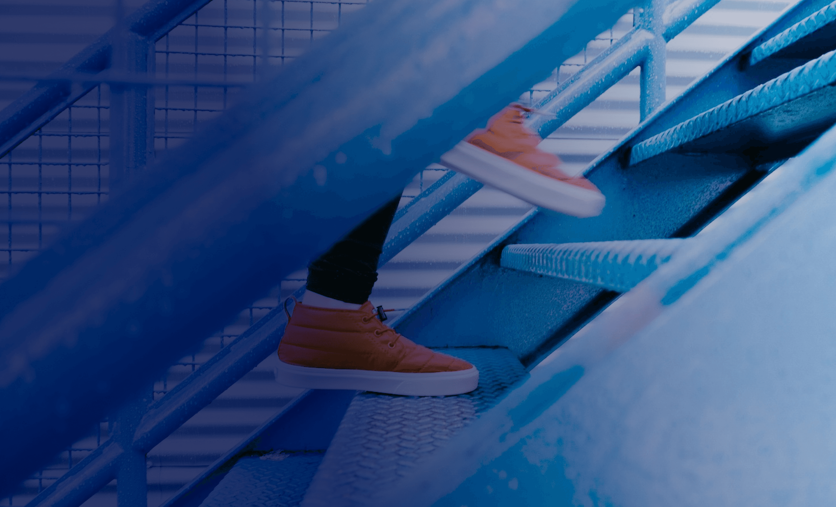 five children smiling while doing peace hand sign