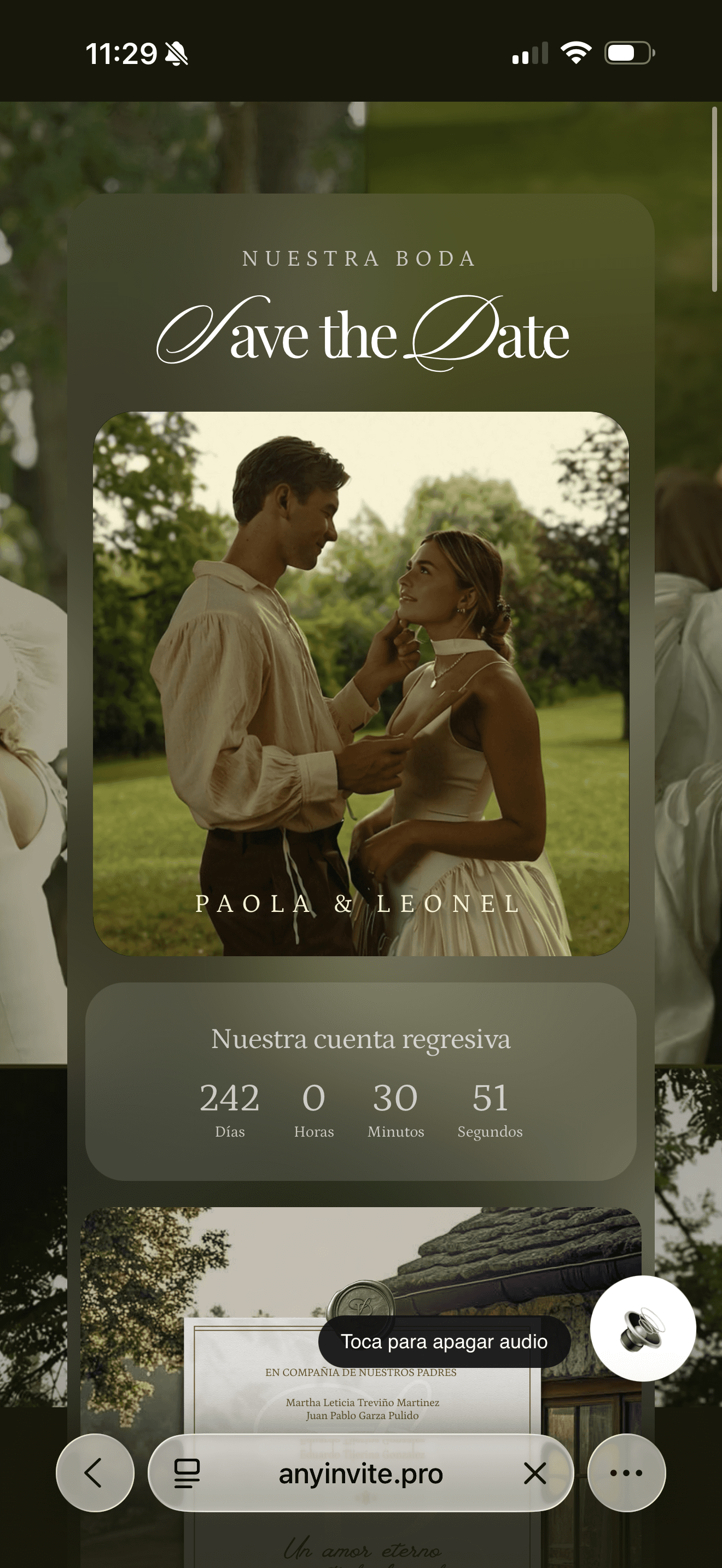 A neon-lit city street at night, shrouded in thick blue fog with glowing pink and purple signs illuminating the haze