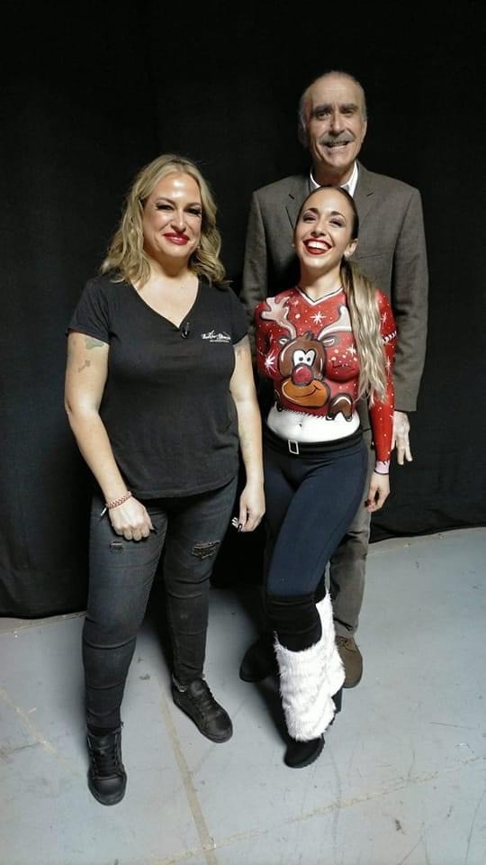 A majestic white cat walking through dreamy, soft clouds in a fantasy sky.