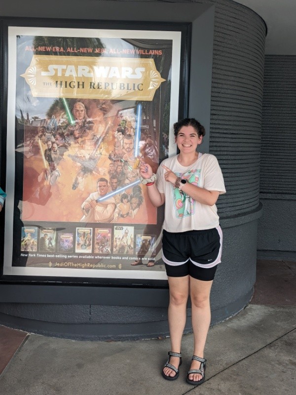 The author next to a promotional poster for the Star Wars: The Hight Republic publishing initiative. 