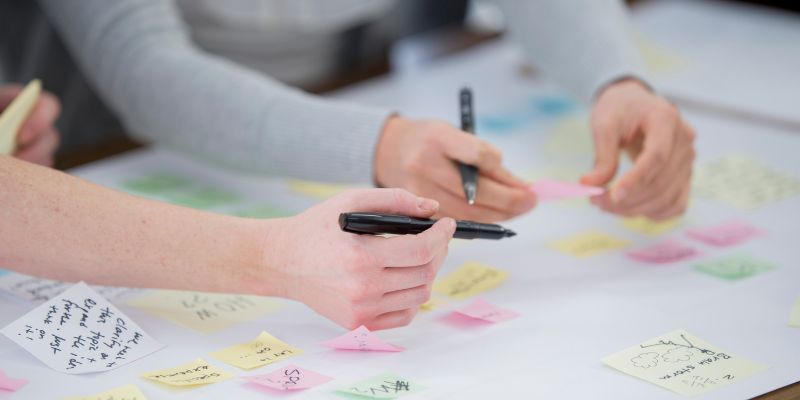 Two employees brainstorming