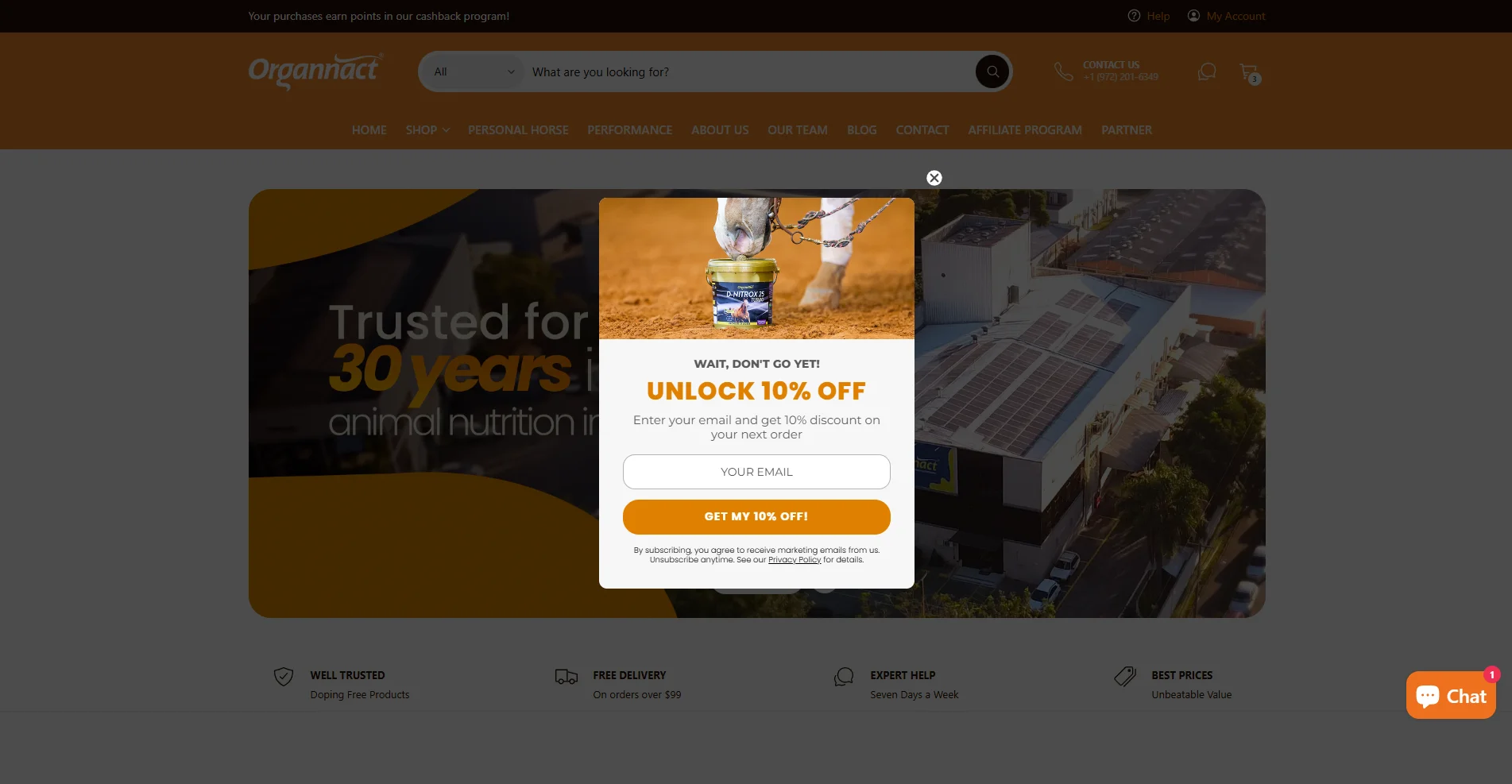 An exit-intent centered popup on the Organnact website intercepting leaving visitors with a "Wait, don't go yet!" 10% discount offer using a single email field.