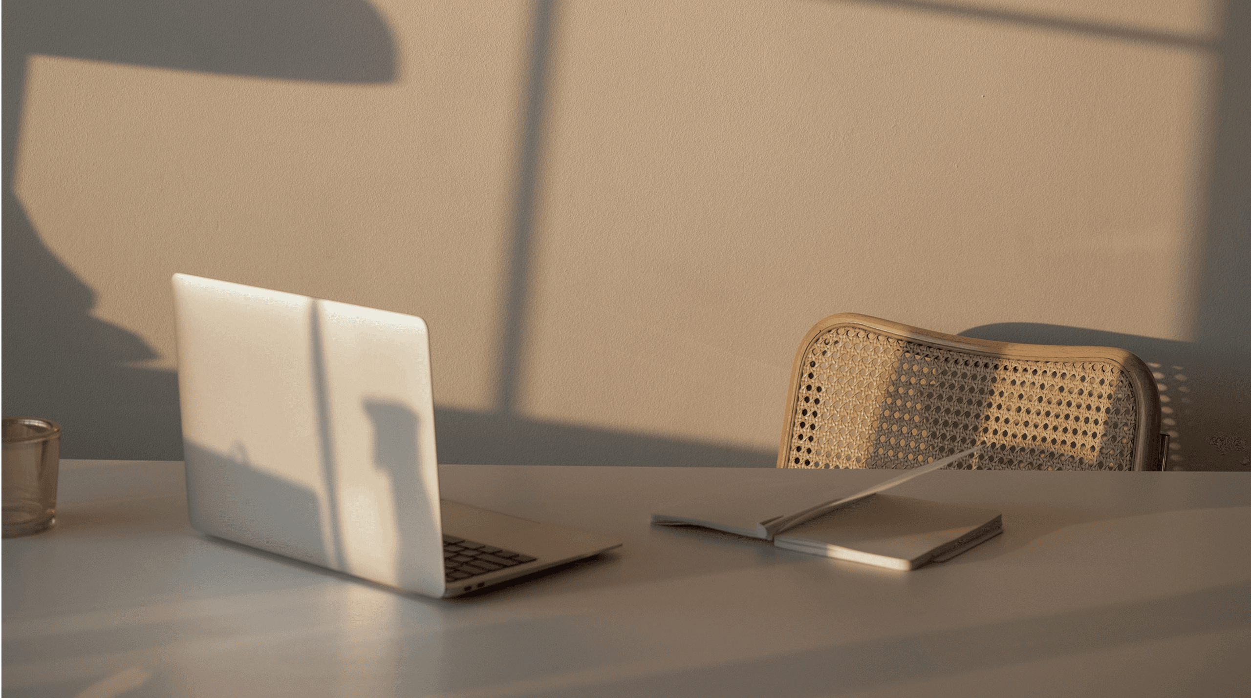 man wearing gray polo shirt beside dry-erase board