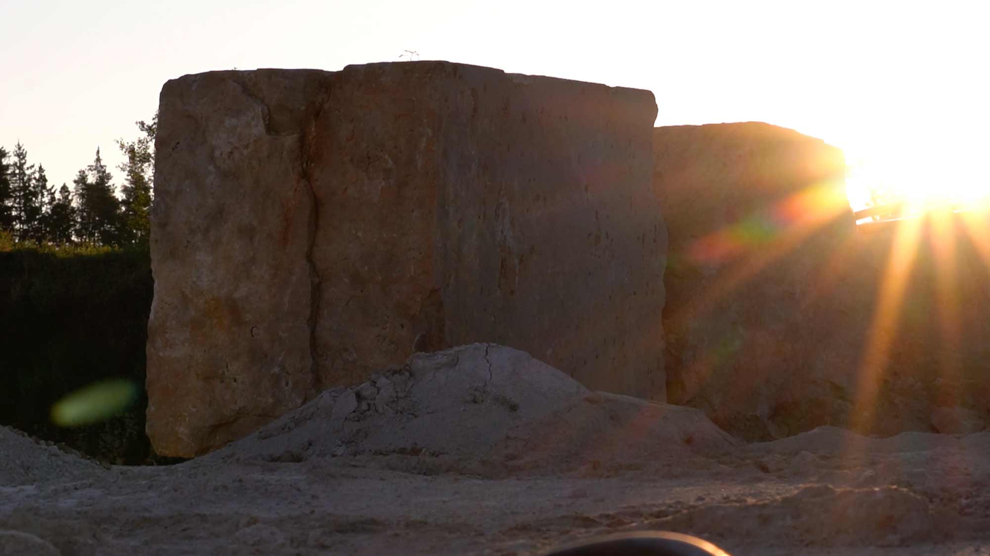 Sunlit stone block at sunset, showcasing filmproduction and photography for ads, storytelling, and social media campaigns.