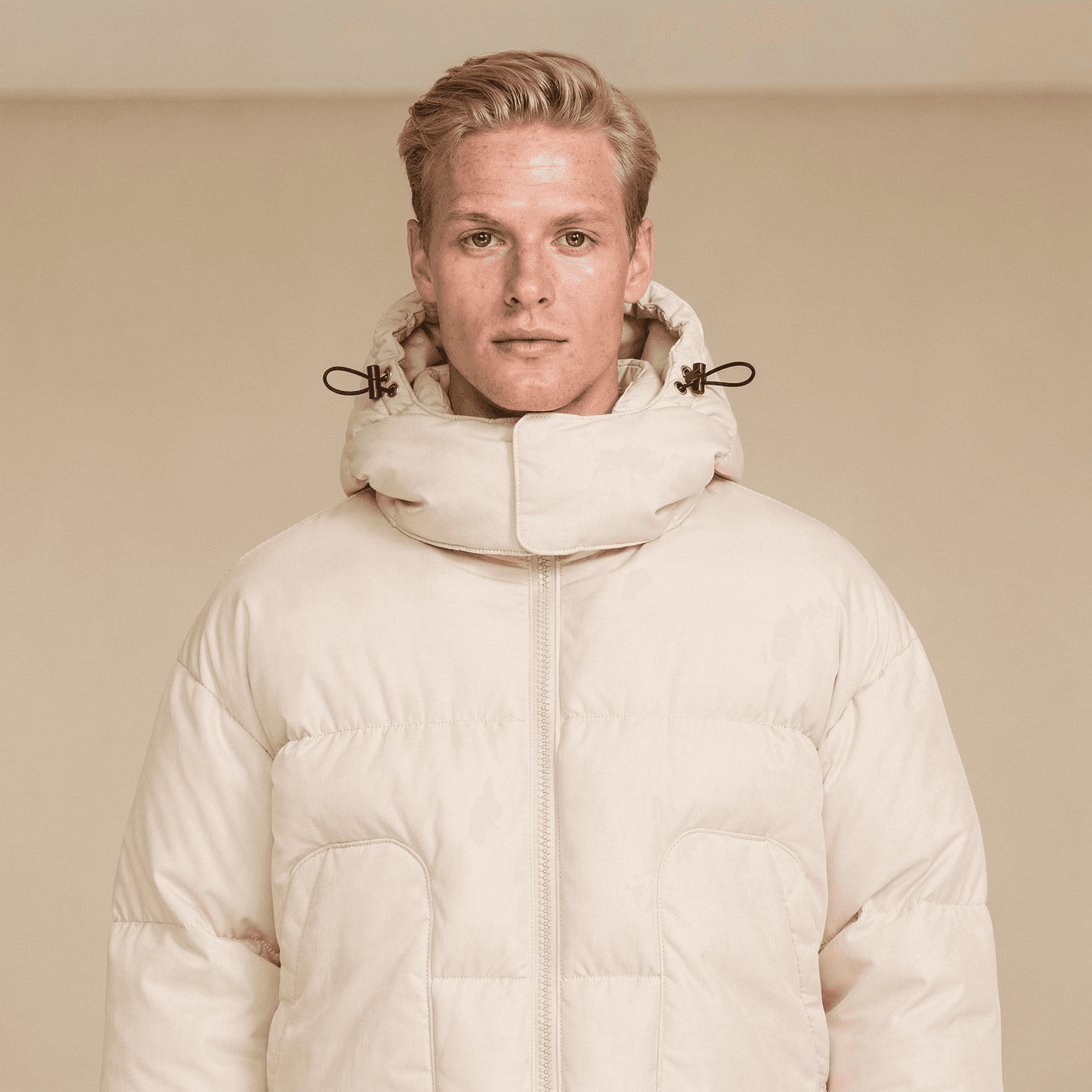 woman holding heft long blonde hair