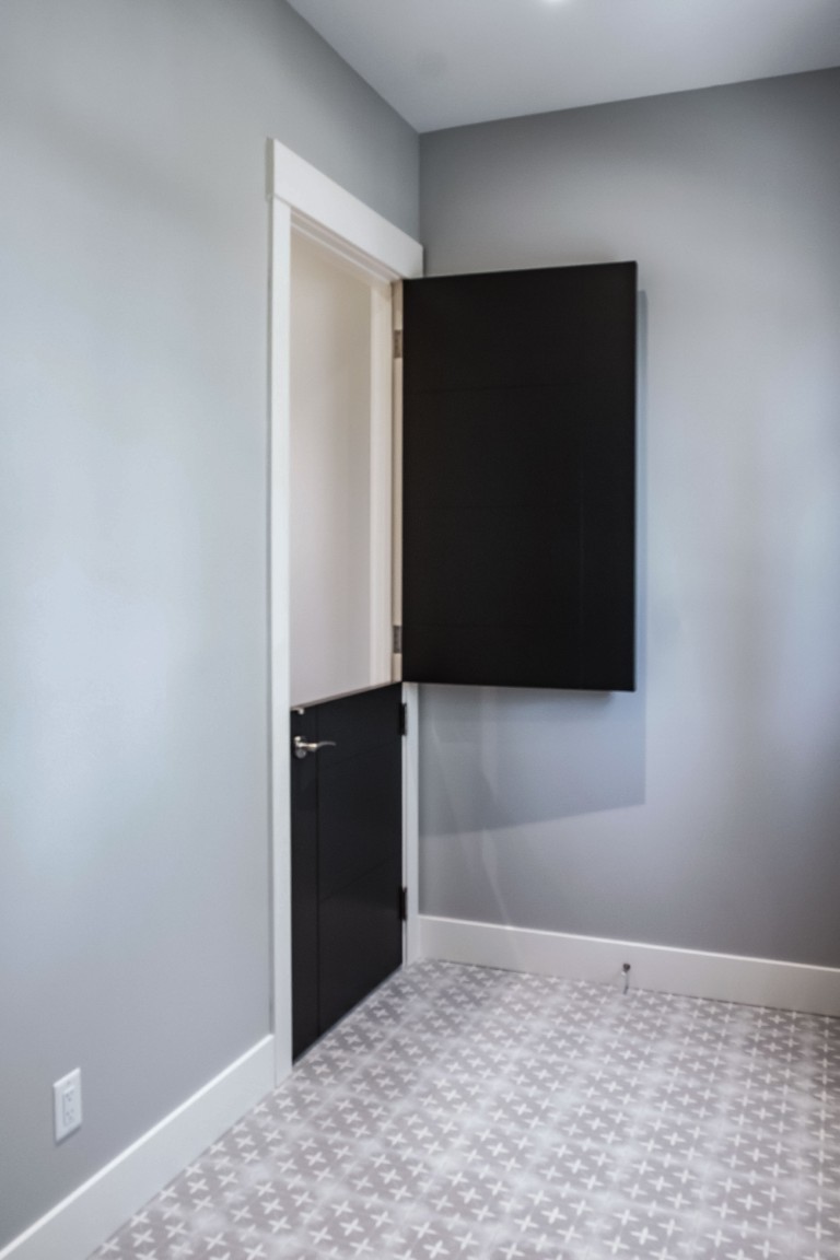 Image of KHD Homes design-build interior with door, window coverings, and layout design for home renovations.