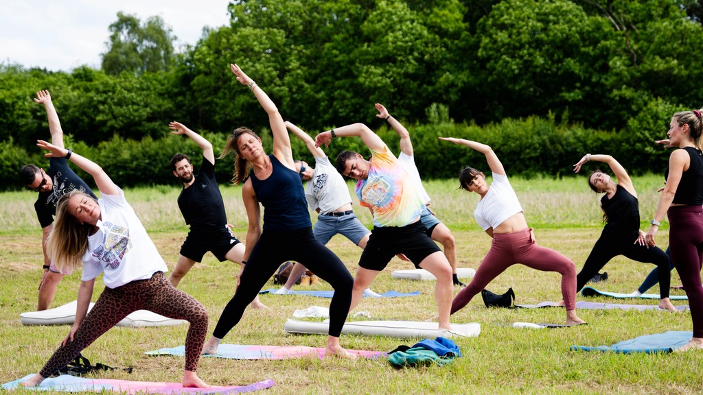 Guests lounging in custom-branded deck chairs