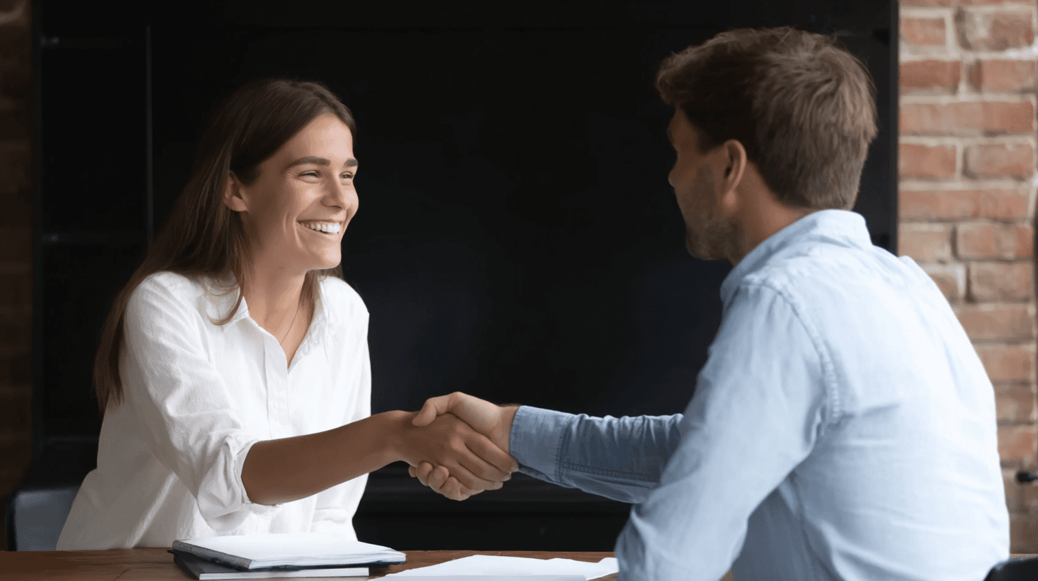 A Recruiter and Job Candidate Shaking Hands