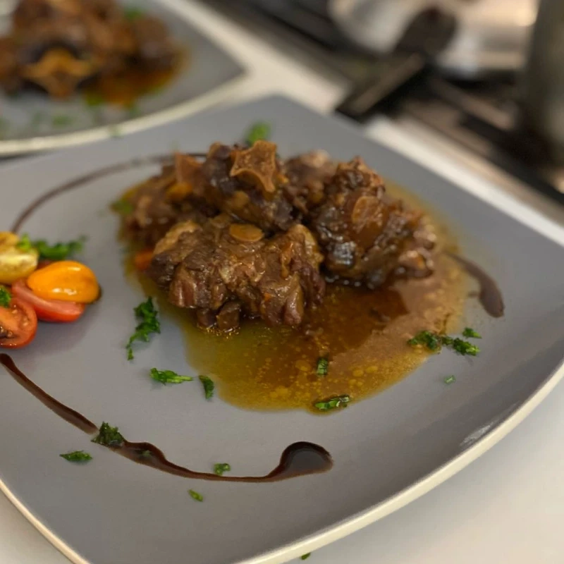 Braised Oxtail with balsamic vinagrette.