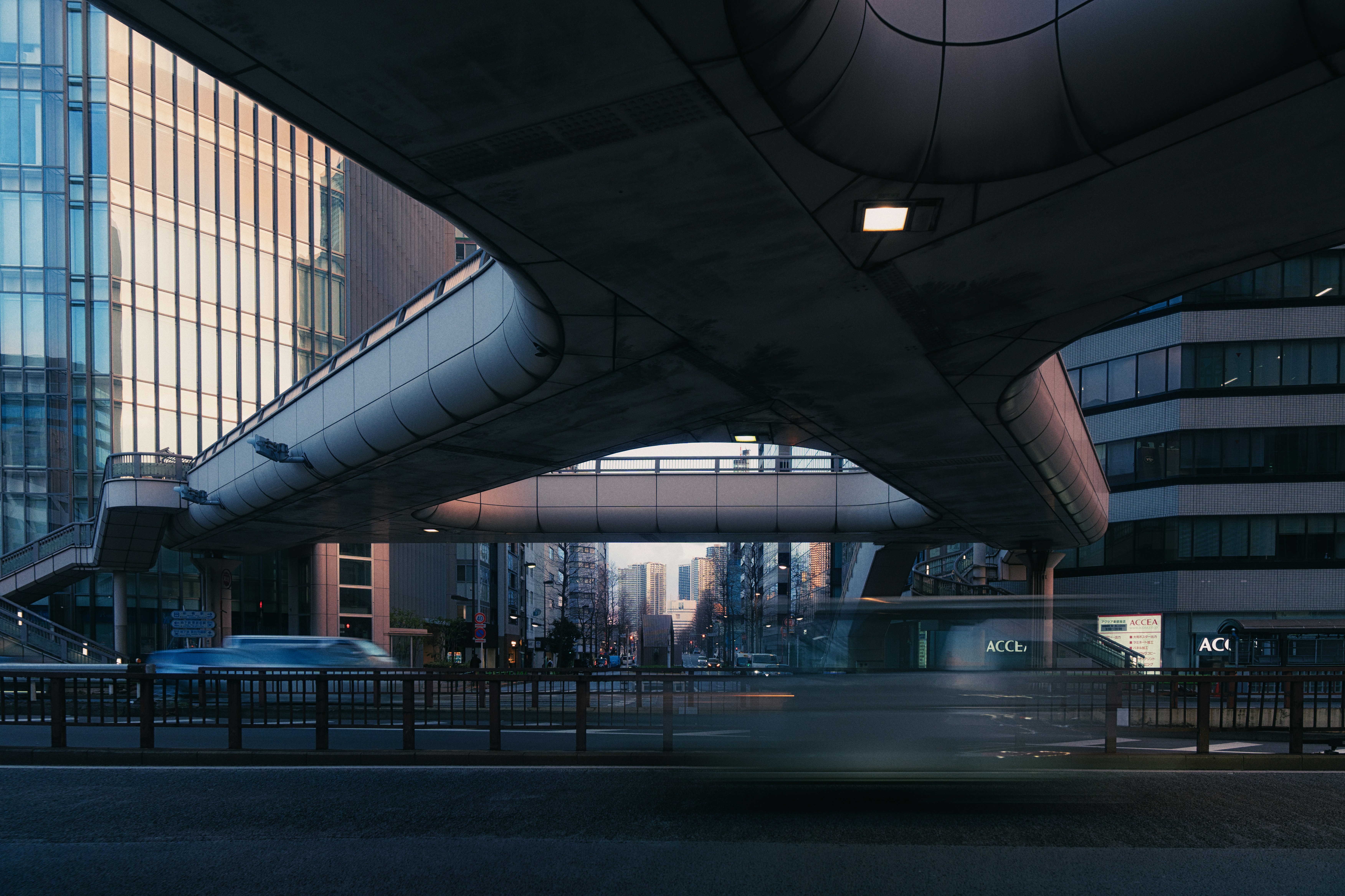 Modern city overpass with buildings and traffic below