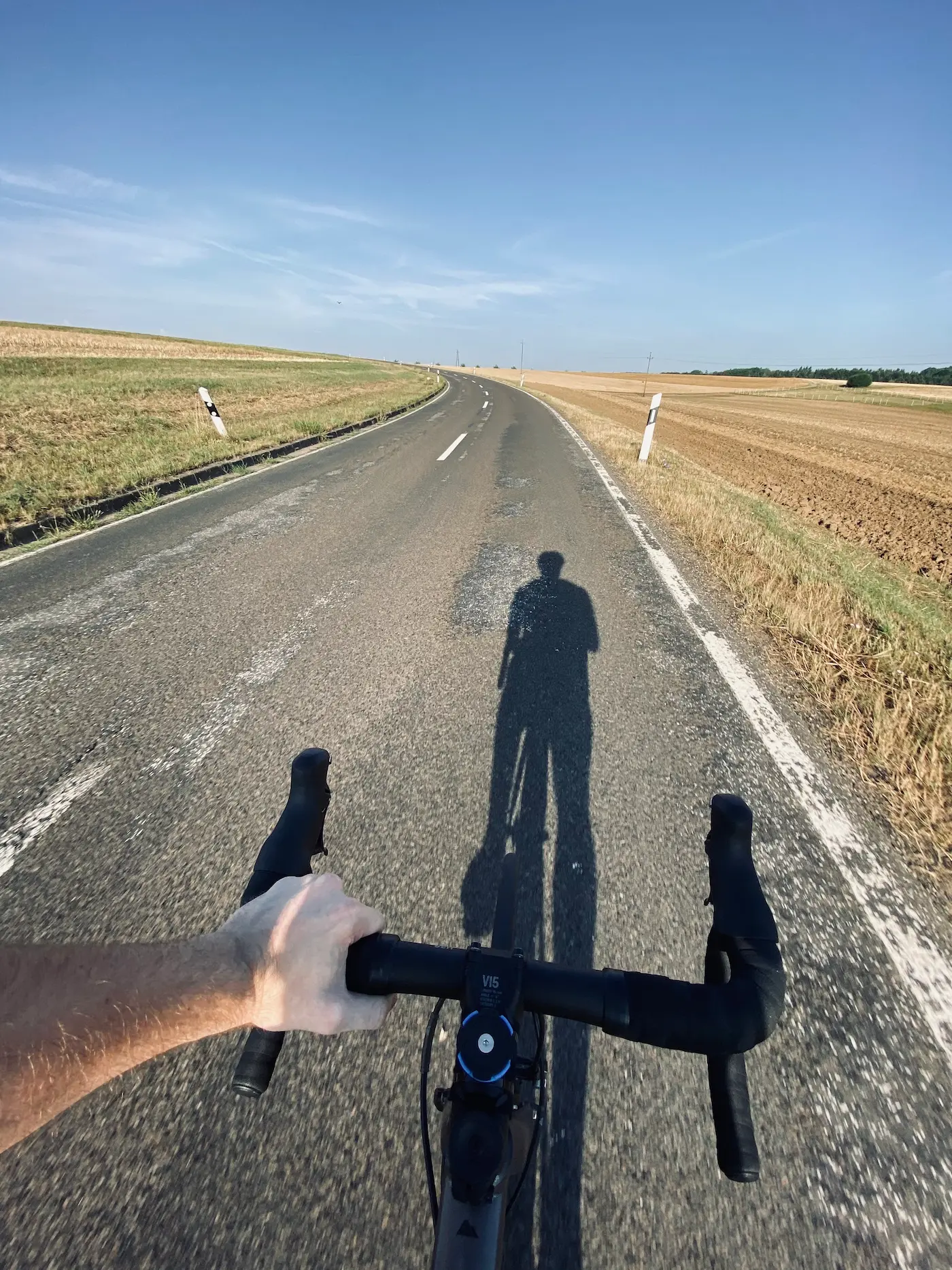 Riding a bicycle with V sign