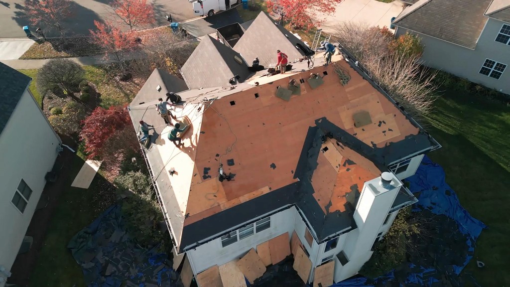 a hand holding a crystal ball with a map on it