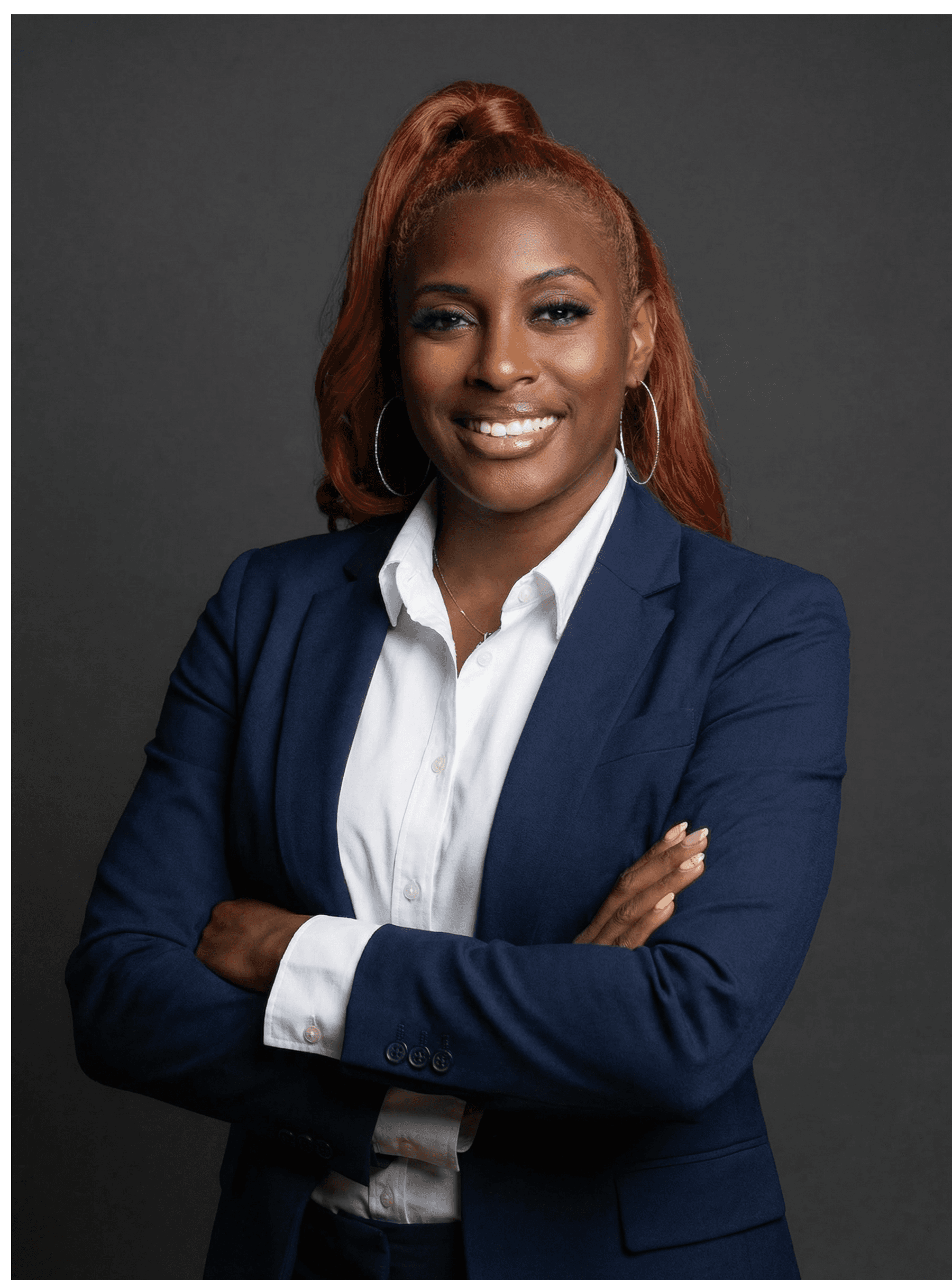 Profile portrait of a man in a white shirt against a light background