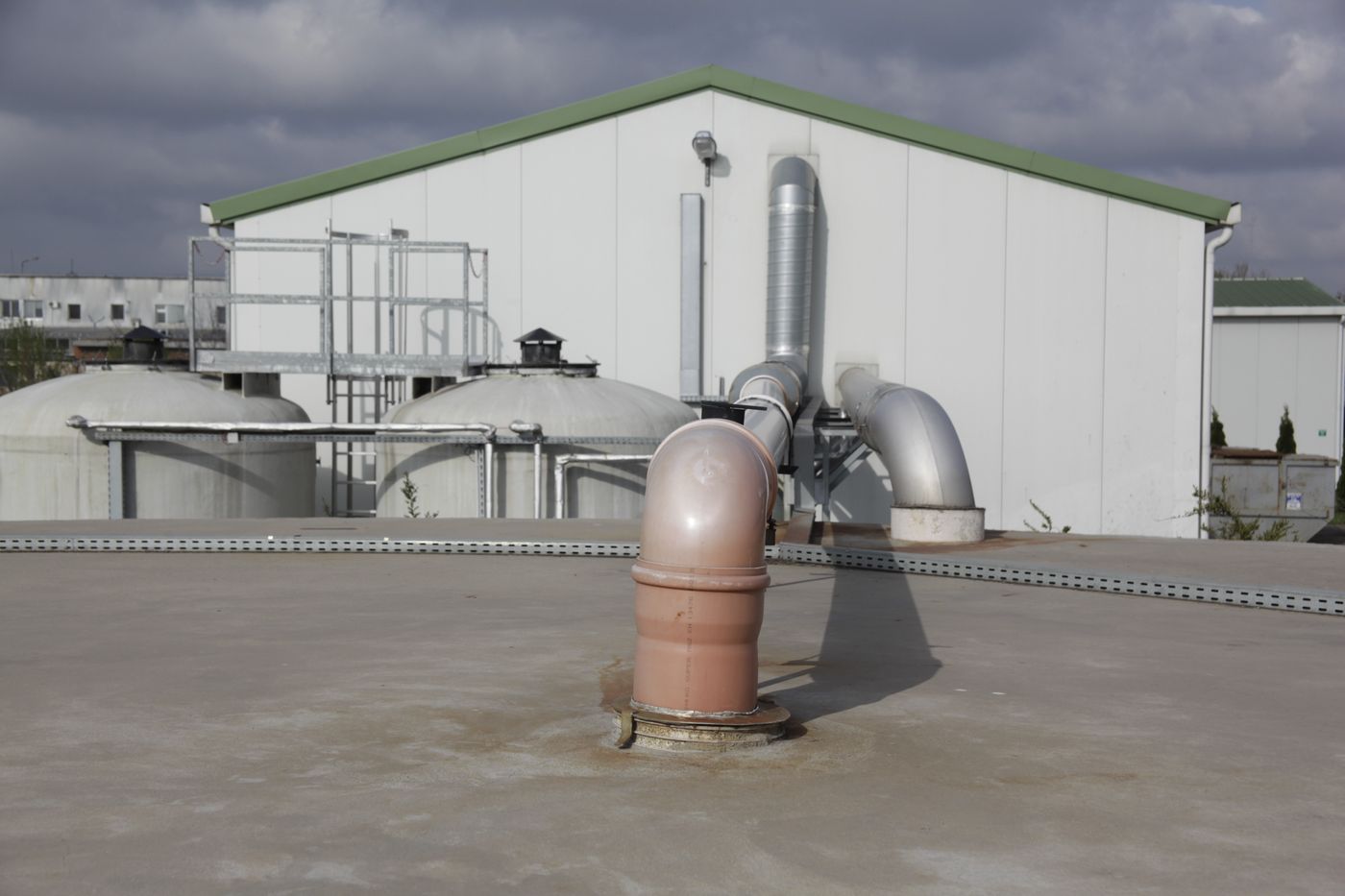 Covered tanks and ventilation pipework at the Hungerit poultry-processing wastewater pre-treatment plant, Szentes, Hungary