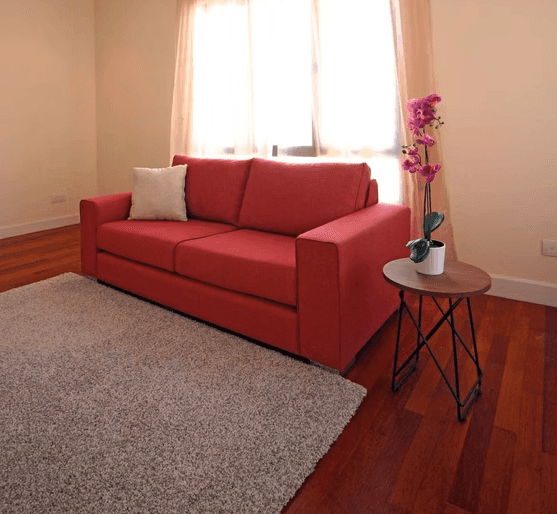 a restaurant with a large table and chairs
