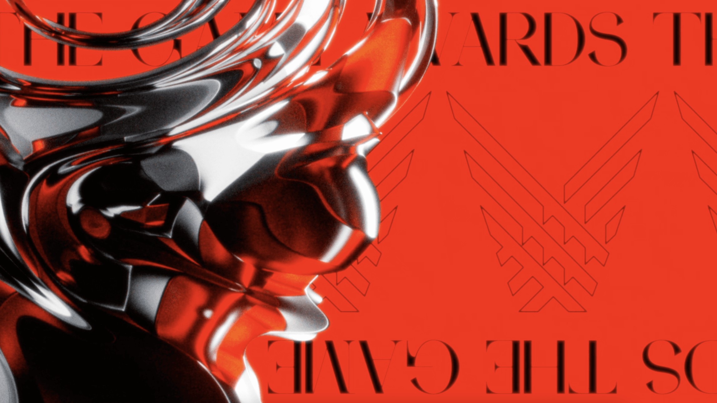 A high-contrast graphic for "The Game Awards" featuring a stylized, chrome-like liquid sculpture with a metallic finish that reflects a vibrant red background. The image includes bold, black serif typography reading "THE GAME AWARDS" and a minimalist winged logo outlined in black.