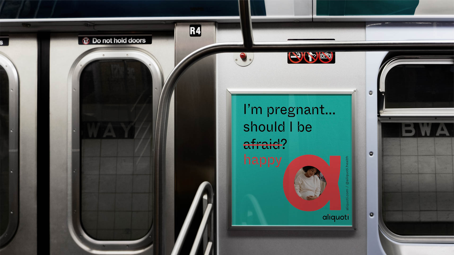 A teal advertisement with a woman’s face is mounted on a subway car door. The text on the ad reads, “I'm pregnant... should I be afraid? happy.” The ad also features the logo “aliquoti” and the website “aliquoti.com/@aliquotihealth” displayed at the bottom. The subway car door is marked “R4” and “Do not hold doors,” with “WAY” visible on the adjacent wall.