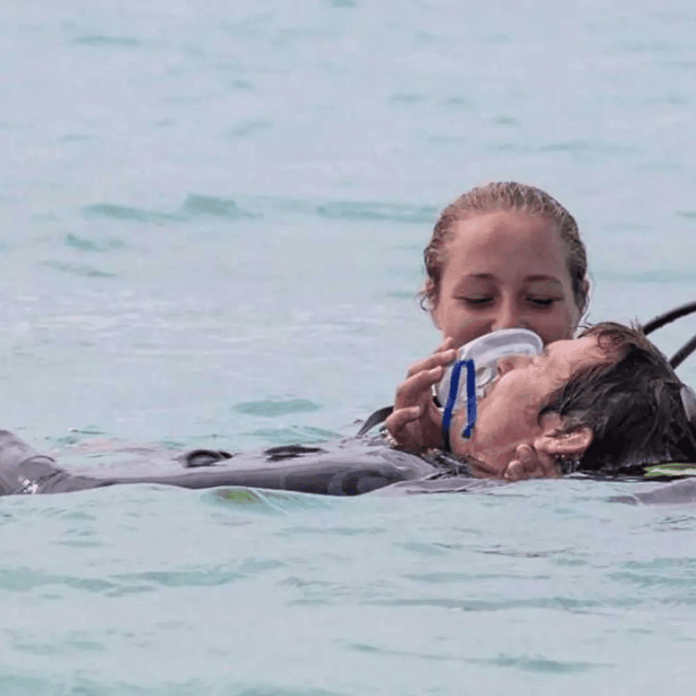 Women Practicing rescue diving