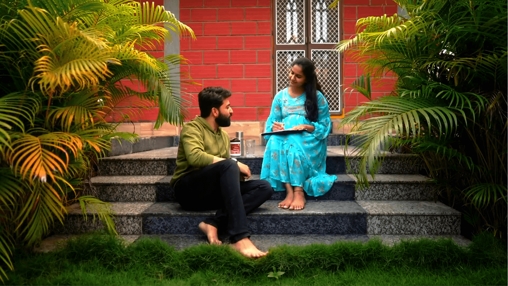 Image of a wellness consultation between two people in a calm outdoor setting for a nutrition and wellness video.
