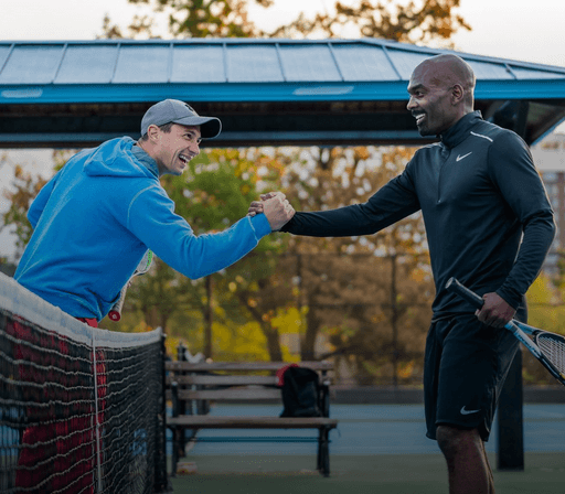 Stefan Stankovi tennis coach at HitAce and advanced player shaking hands after a sparring session at a private court in Maryland