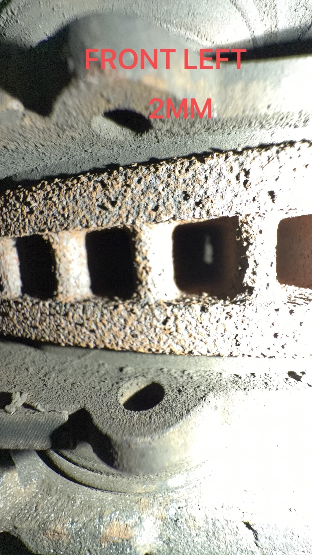 Front brake pads measured at 2mm during the inspection