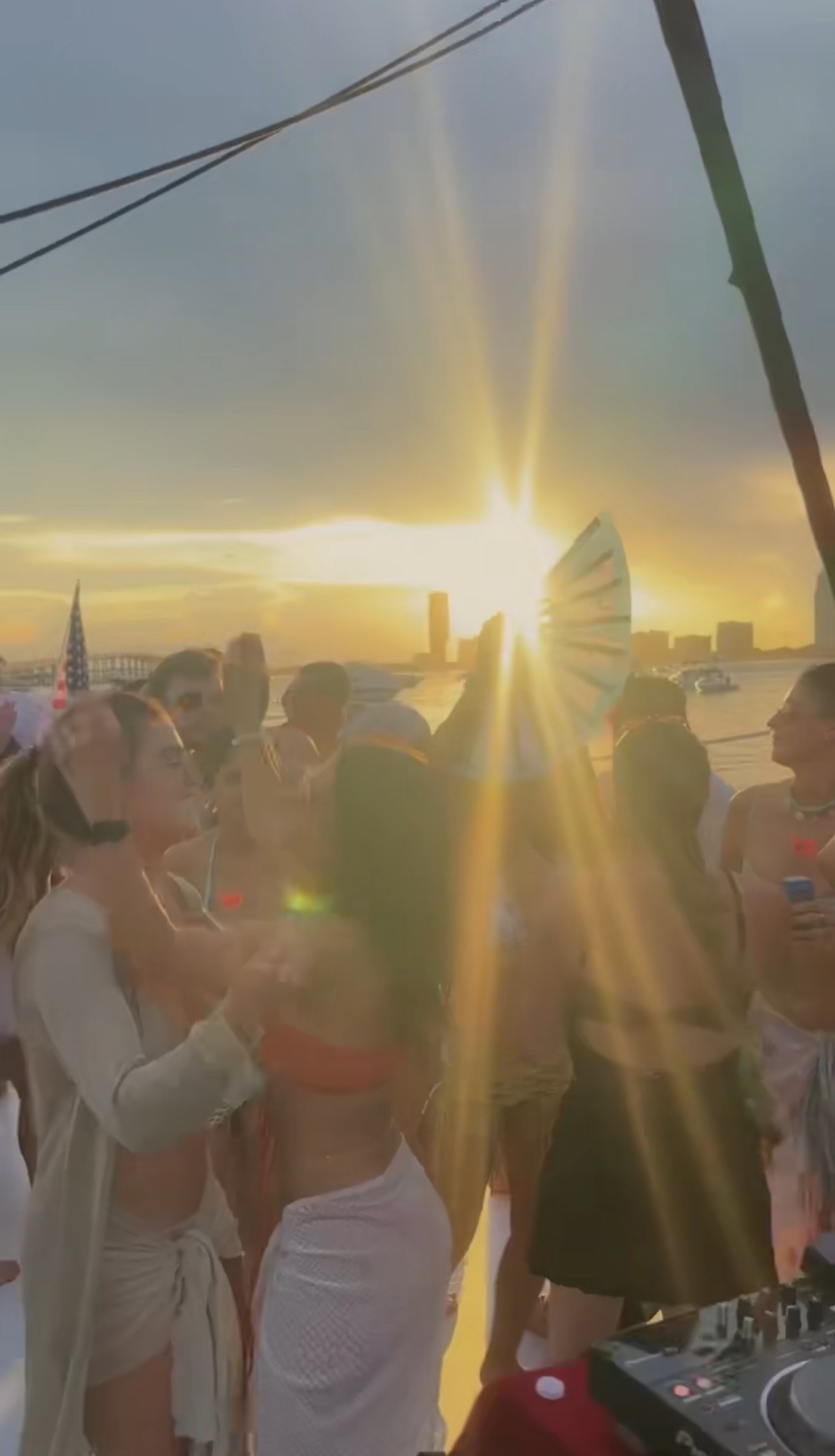 a couple of people standing on top of a mountain