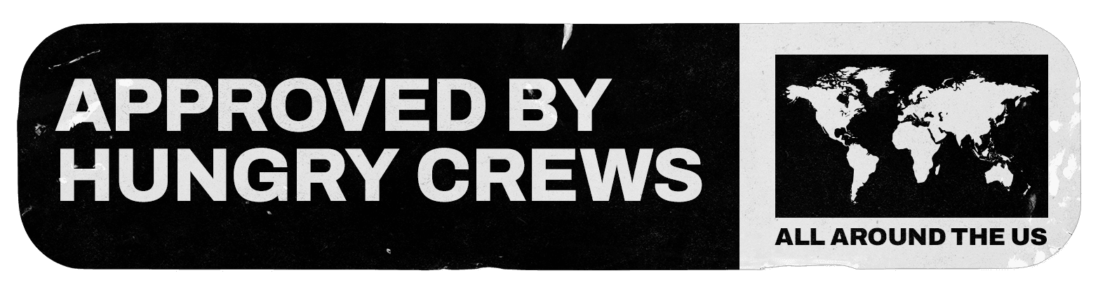 A rectangular black badge with white text reading "Approved by Hungry Crews" and a world map icon.