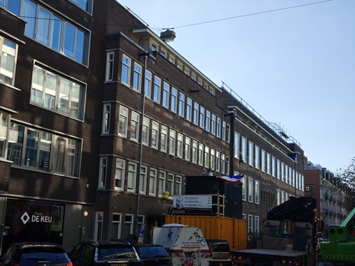 a building that has a bunch of pipes attached to it