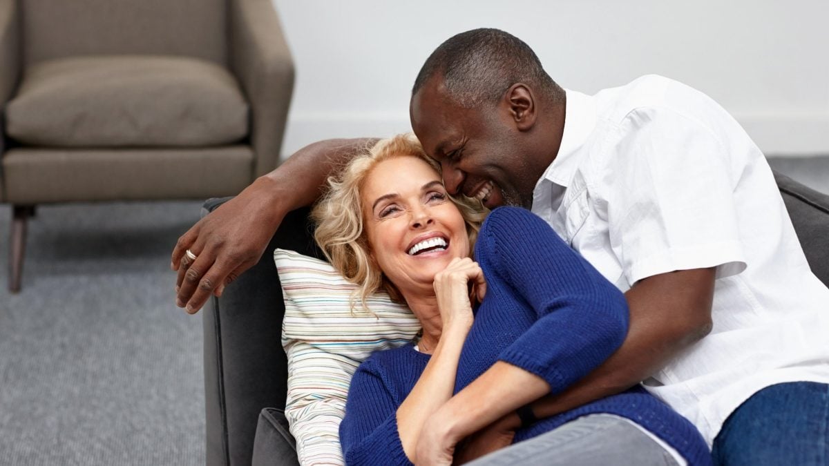 black framed eyeglasses and black pen