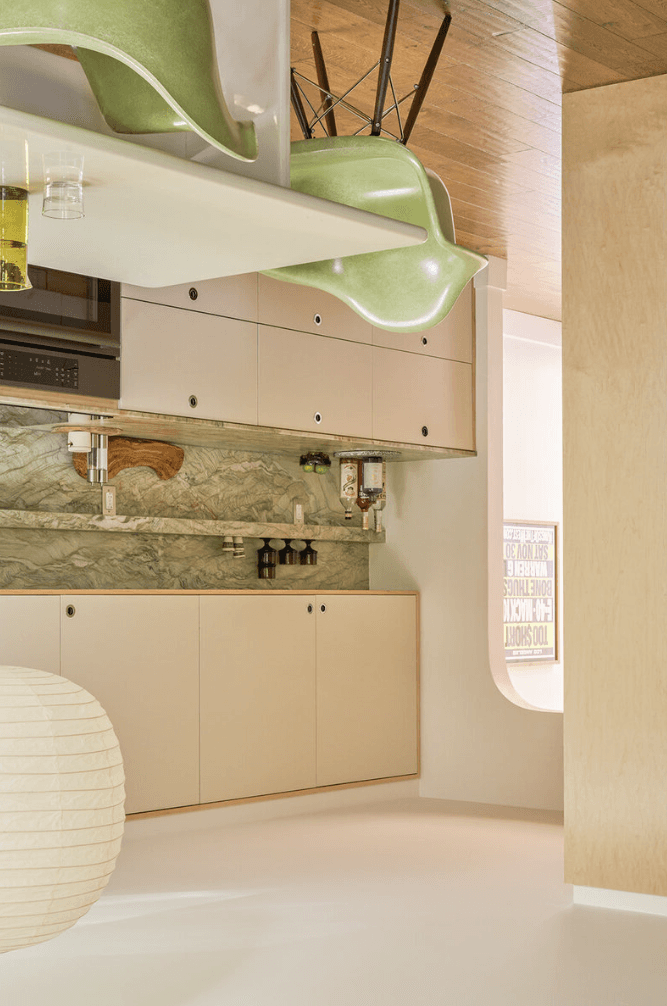 kitchen and dining area with warm lighting and considered details