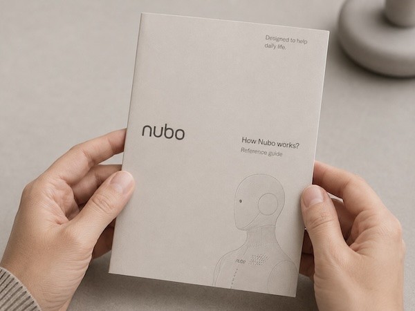 Hand pressing a Nubo wall-mounted circular control device
