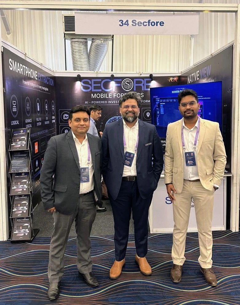 Secfore’s National Sales Manager, CEO, and Product Specialist at the company’s mobile forensics booth during the 11th INTERPOL DFEG Meeting and 1st International Investigators’ Summit at NFSU Gandhinagar, 13–15 July 2026.