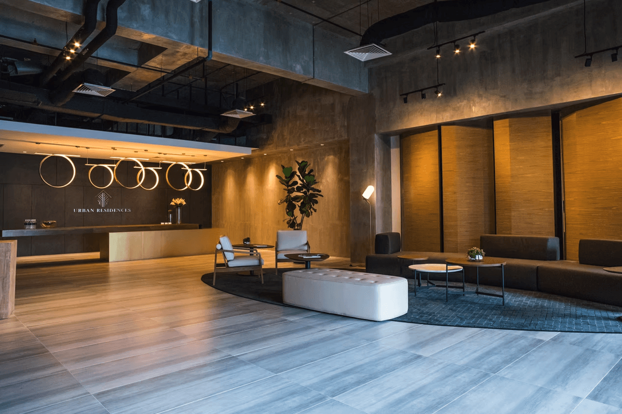 a living room with two recliners and a sink