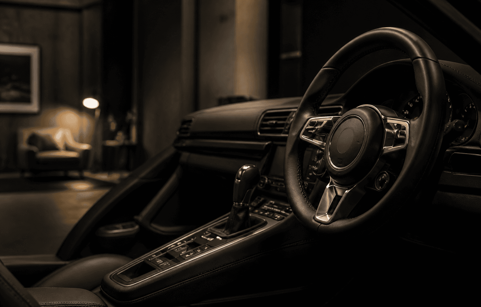 Black leather sports car cockpit in a softly lit automotive studio