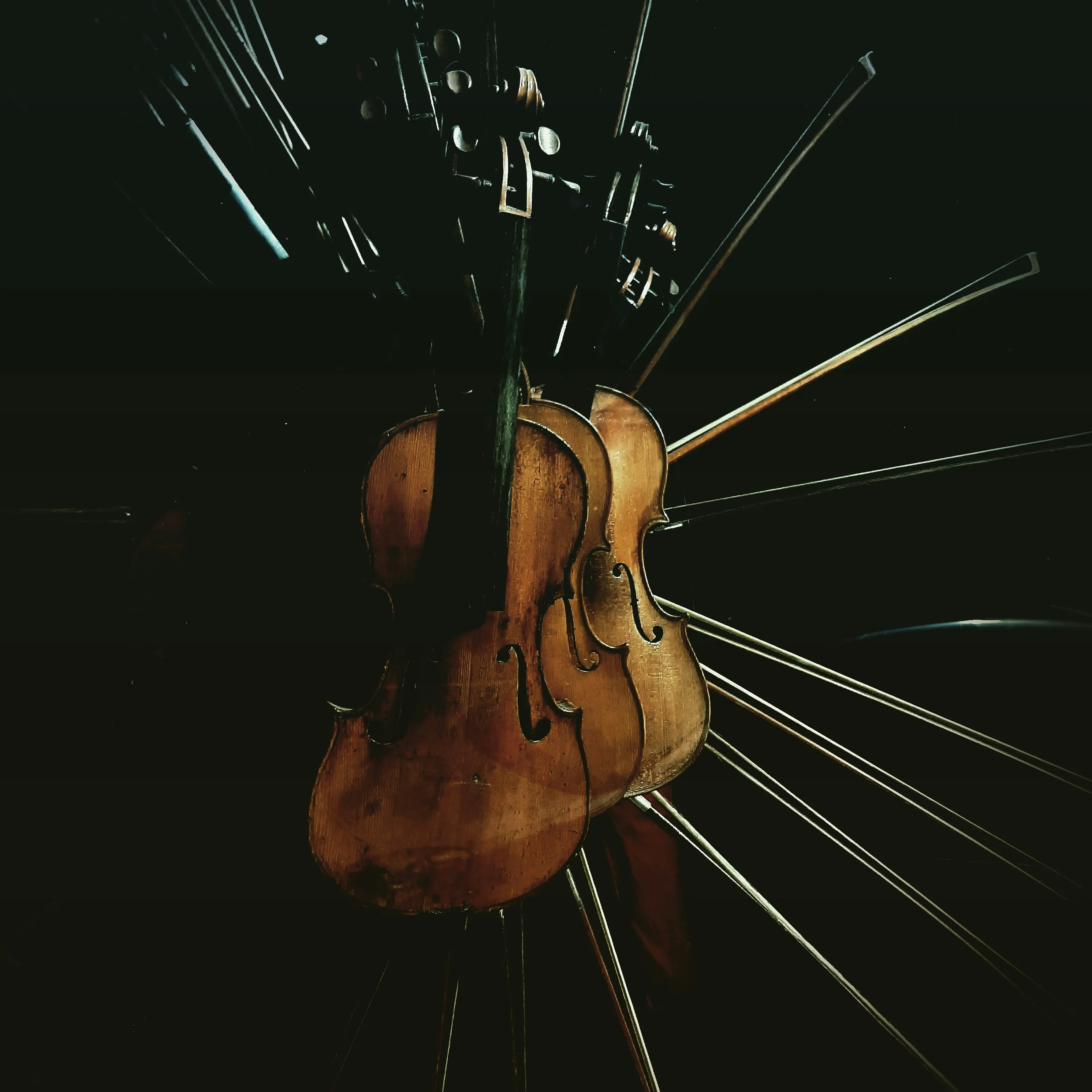 "A dark, textured background featuring the subtle outline of a violin, with a list of music production services overlayed: End-to-End Music Production—No AI Crutches, From Demo to Master, We Handle Every Step, including Professional Mixing, Studio Mastering, Full Track Production, Stem Remixing & Fixes, and Vocal Tuning & Enhancement."