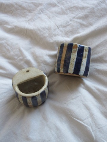Blue and white striped ceramic cup