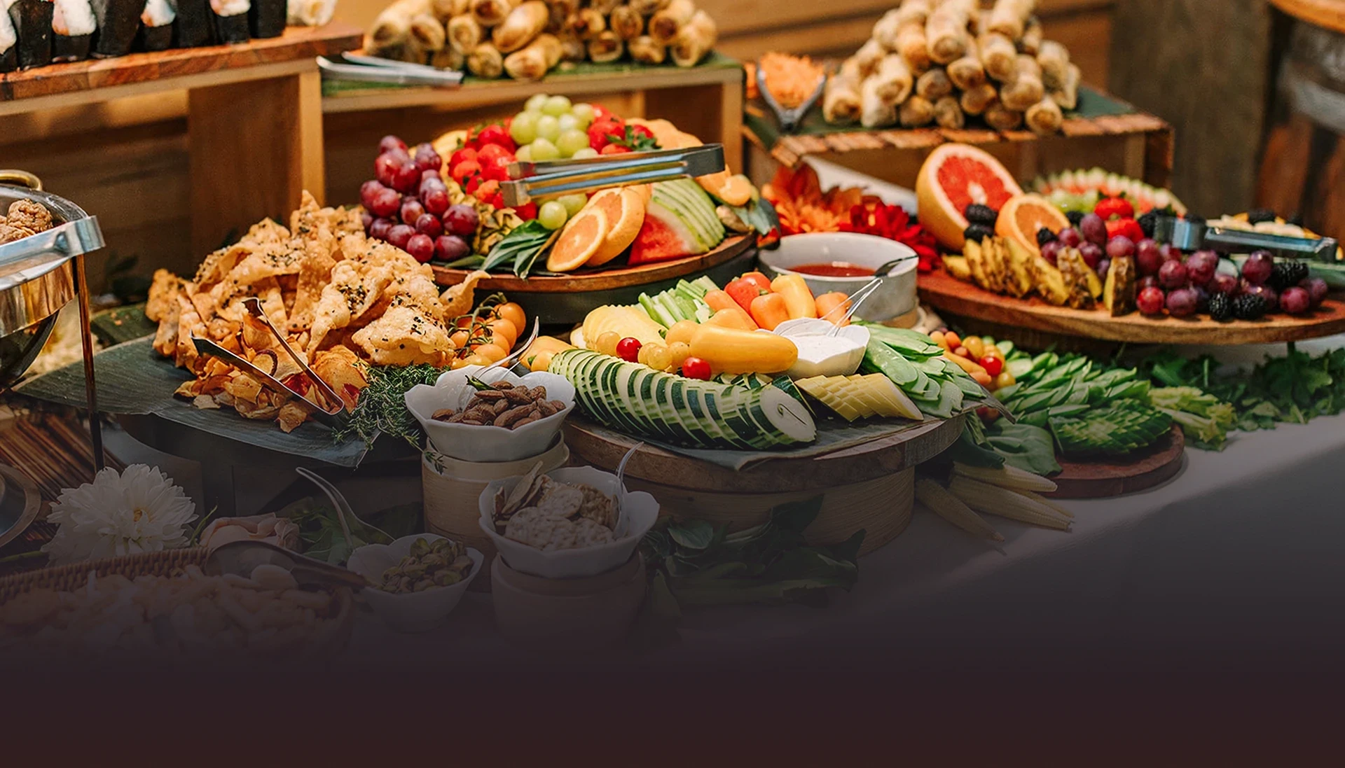 Buddha Bruddah Professional Catering buffet with Hawaiian fruits and appetizers