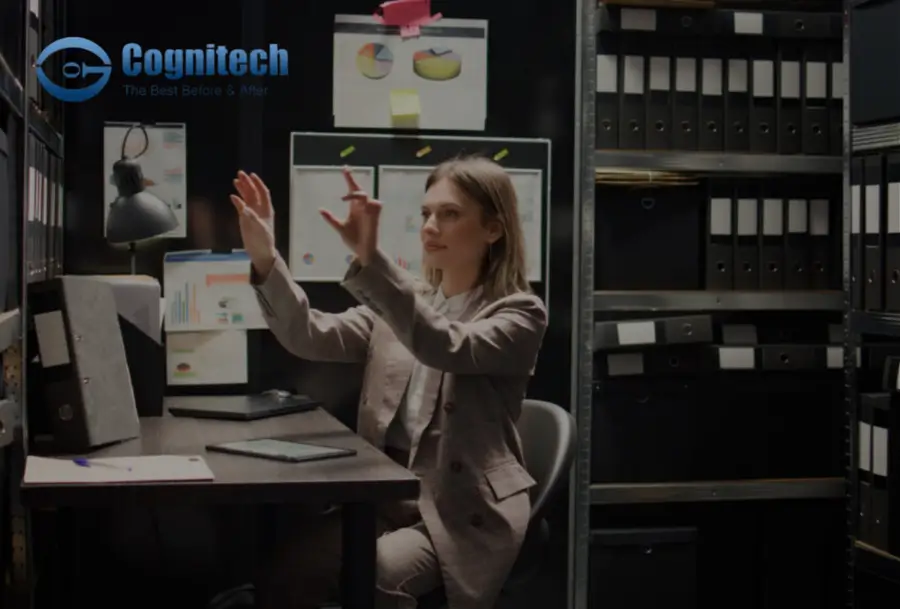 Businesswoman using augmented reality in a digital archive, Cognitech logo.