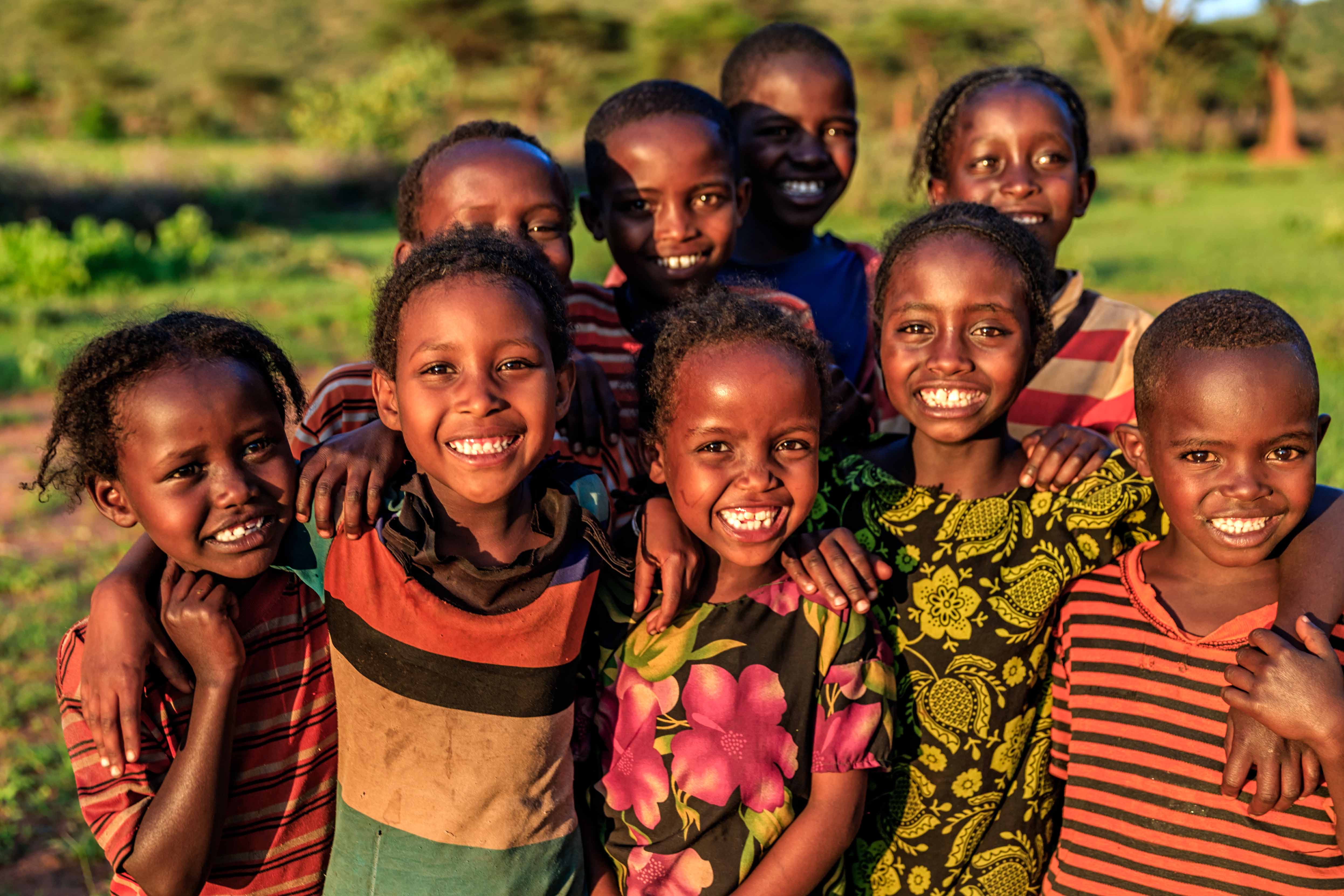 a group of young people standing next to each other